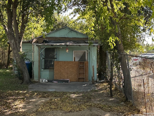 back of house featuring a patio area