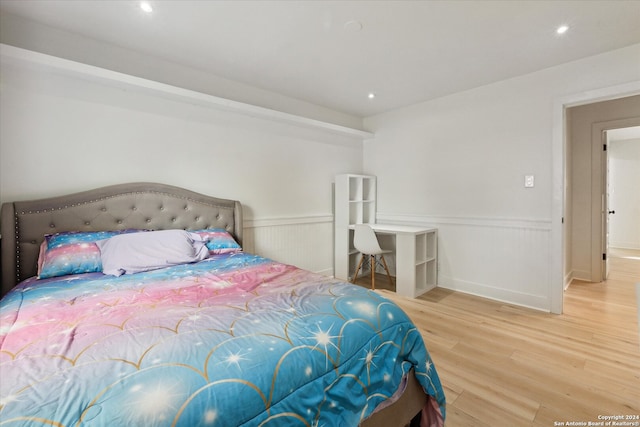 bedroom featuring hardwood / wood-style floors