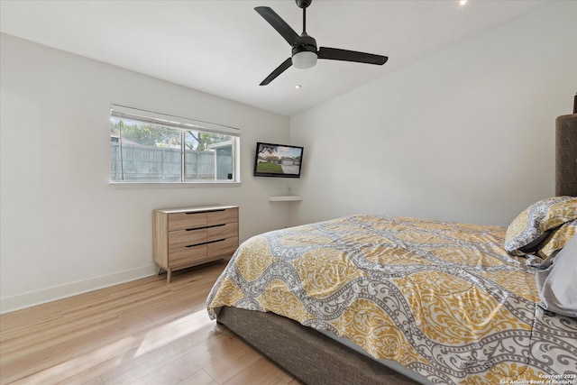 bedroom with light wood-type flooring and ceiling fan