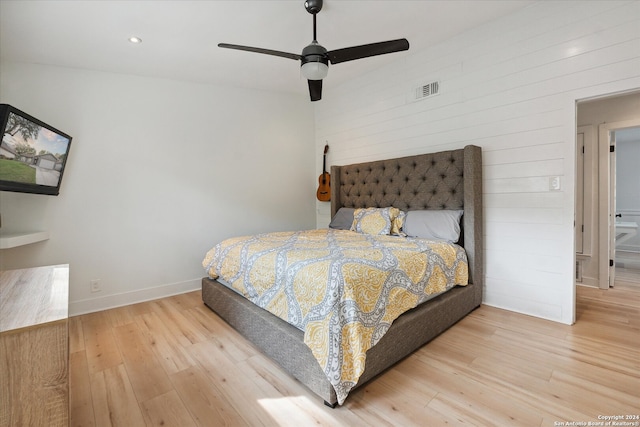 bedroom with ceiling fan and light wood-type flooring