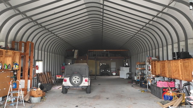 garage with white refrigerator