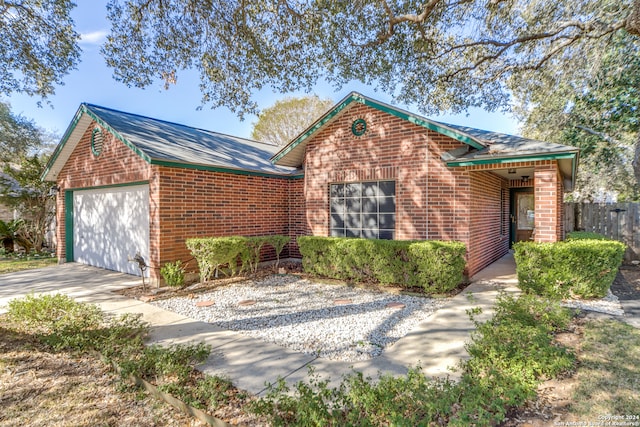 view of front of property with a garage