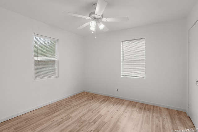 empty room featuring light hardwood / wood-style floors and ceiling fan