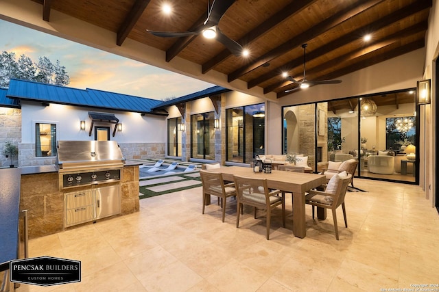 exterior space featuring beam ceiling, ceiling fan, and wooden ceiling