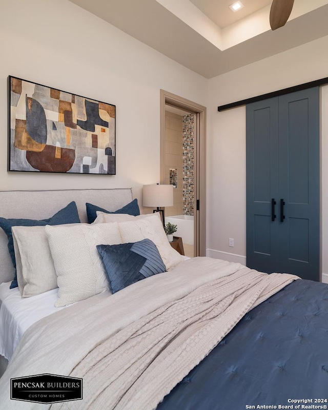 bedroom featuring ceiling fan and a closet