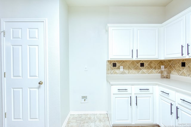 laundry room with light tile patterned floors