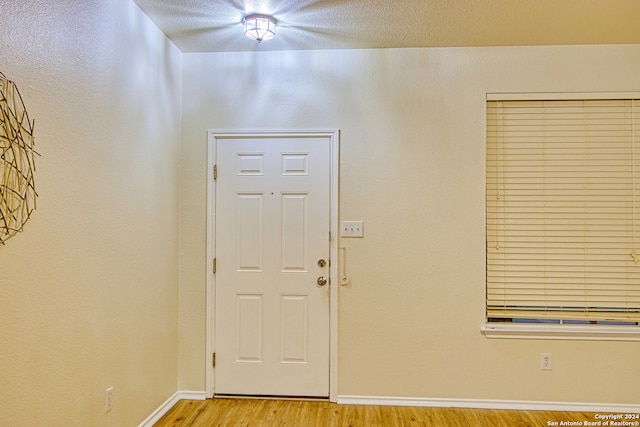 foyer with light wood-type flooring