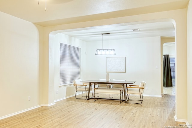 dining room featuring light hardwood / wood-style flooring