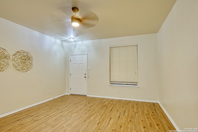 spare room with light wood-type flooring