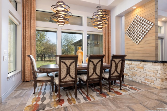 dining space featuring a chandelier