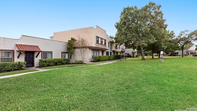 exterior space featuring a lawn