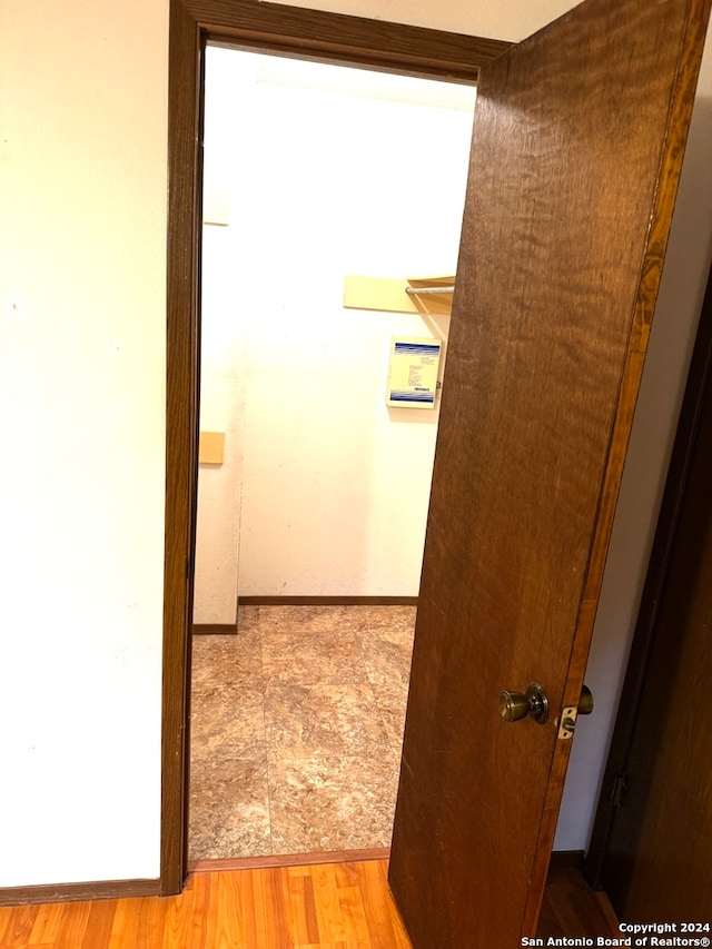 hallway featuring light hardwood / wood-style flooring