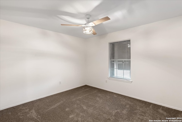 carpeted empty room with ceiling fan