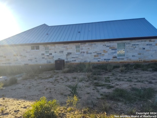 view of home's exterior featuring central AC