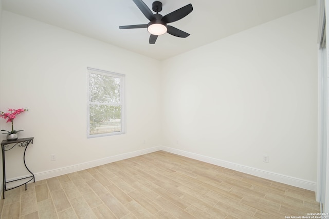 unfurnished room featuring light hardwood / wood-style floors and ceiling fan