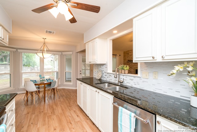 kitchen featuring white cabinets, sink, pendant lighting, light hardwood / wood-style flooring, and dishwasher