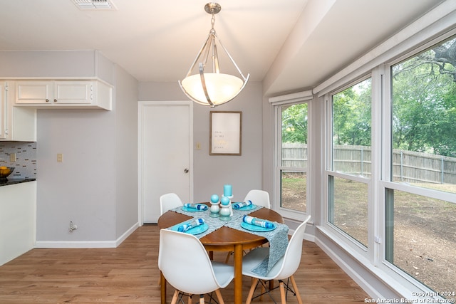 dining room with light hardwood / wood-style floors