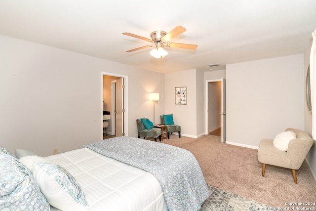 bedroom featuring ceiling fan and light carpet