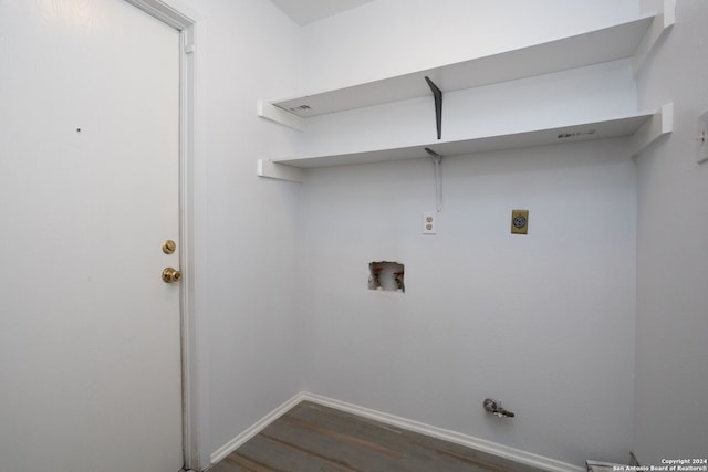 washroom featuring electric dryer hookup, dark hardwood / wood-style floors, gas dryer hookup, and hookup for a washing machine