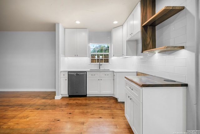 kitchen with sink, dishwasher, decorative backsplash, white cabinets, and light wood-type flooring