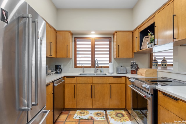 kitchen with sink and appliances with stainless steel finishes