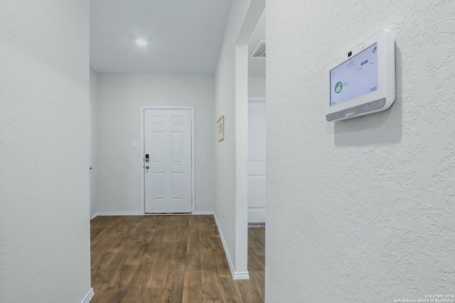 hall featuring dark hardwood / wood-style floors