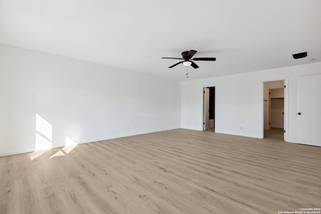 unfurnished room featuring ceiling fan and light hardwood / wood-style floors