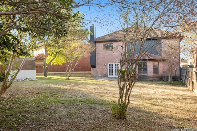 view of yard featuring french doors