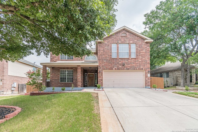 front of property with a porch, a garage, and a front lawn