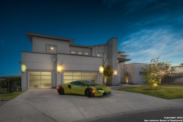 view of front of property with a garage