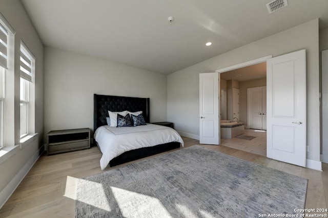 bedroom with light hardwood / wood-style flooring