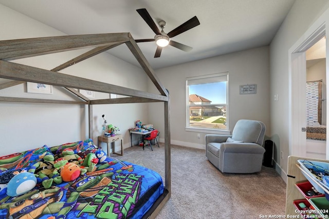 carpeted bedroom featuring ceiling fan and vaulted ceiling with beams