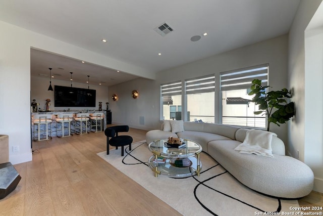 living room featuring light wood-type flooring