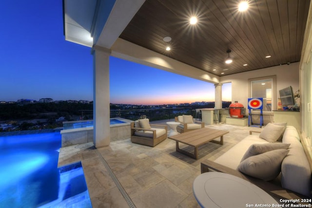 view of patio with a pool with hot tub and an outdoor living space