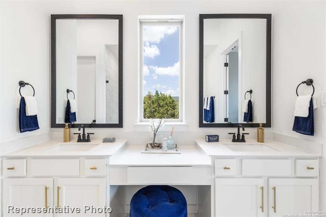 bathroom with a wealth of natural light and vanity