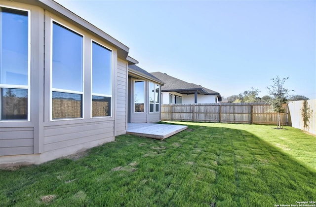 view of yard with a deck