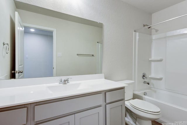 full bathroom with vanity,  shower combination, and toilet