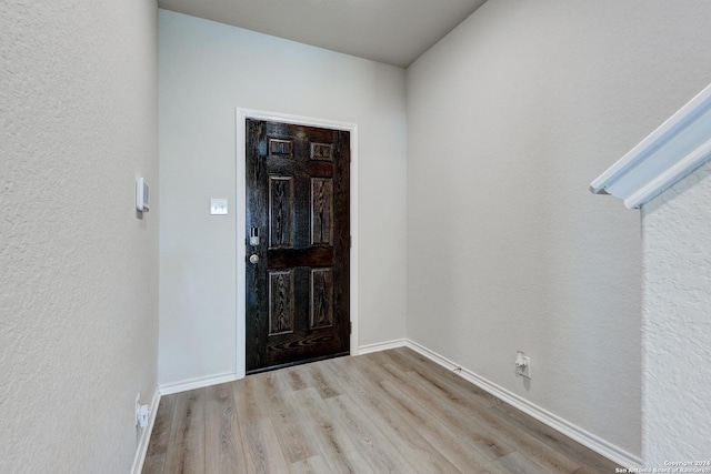 foyer entrance featuring light hardwood / wood-style floors