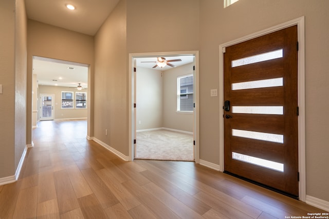 entryway featuring ceiling fan and light wood-type flooring