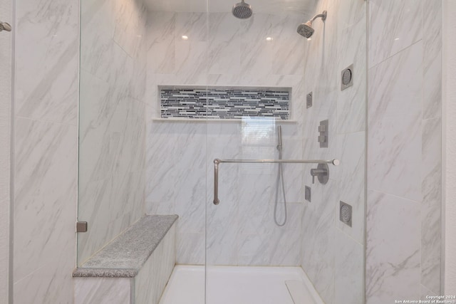 bathroom with an enclosed shower