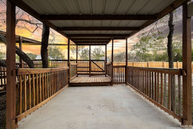 view of patio terrace at dusk