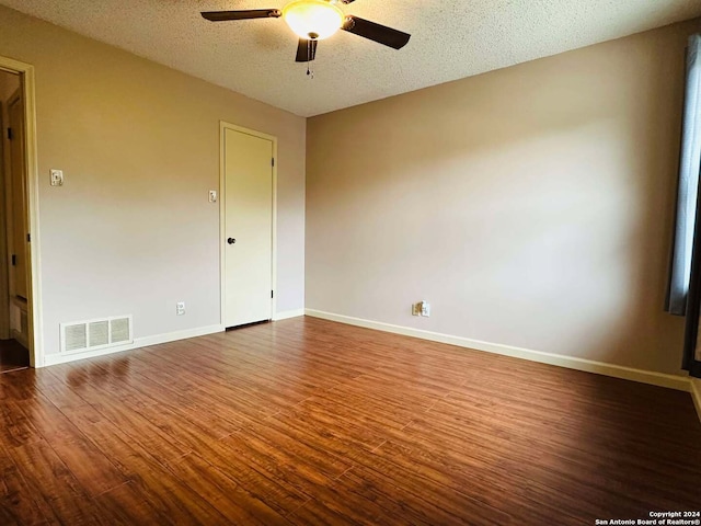 15618 Elks Pass St, San Antonio, TX 78232 - spare room with wood finished floors, a ceiling fan, baseboards, and a textured ceiling