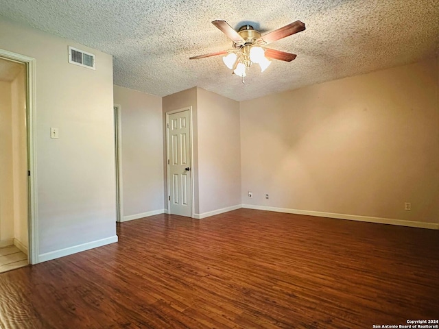 15618 Elks Pass St, San Antonio, TX 78232 - empty room featuring ceiling fan, wood finished floors, a textured ceiling, and baseboards