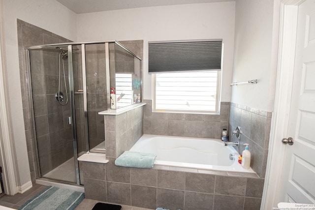 bathroom with independent shower and bath