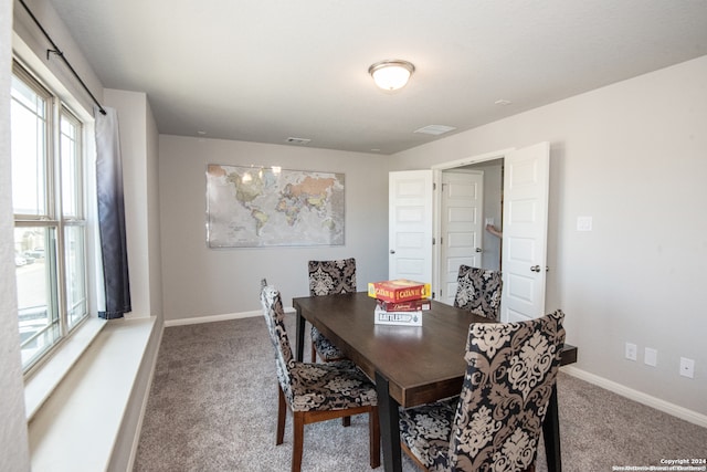 view of carpeted dining room