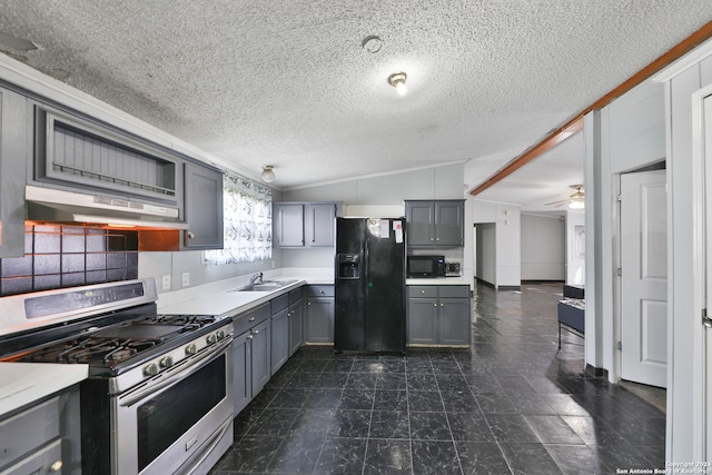 kitchen with extractor fan, a textured ceiling, vaulted ceiling, gray cabinets, and black appliances