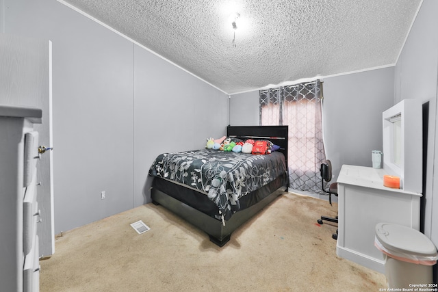 carpeted bedroom with crown molding, lofted ceiling, and a textured ceiling