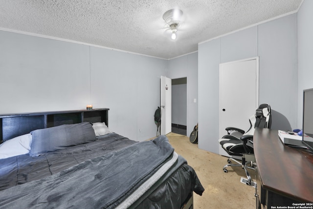 bedroom featuring light colored carpet, ornamental molding, and a textured ceiling