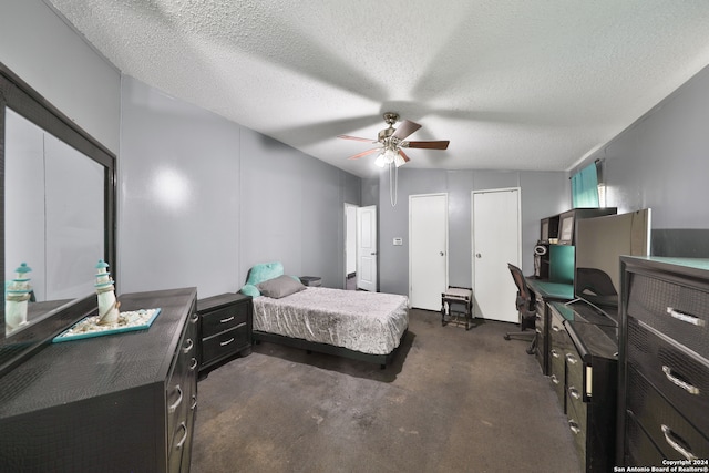 carpeted bedroom featuring ceiling fan, lofted ceiling, and a textured ceiling