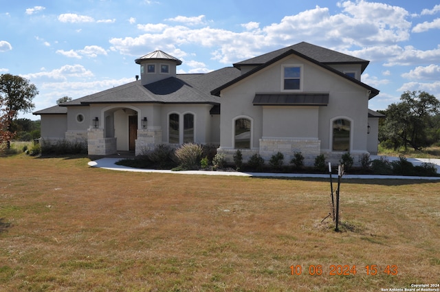 view of front of house with a front yard